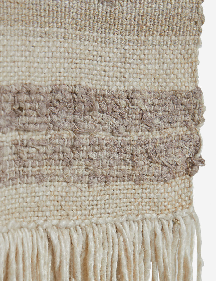 #color::natural | Close up of the Alvah handwoven textural striped textile wall hanging.