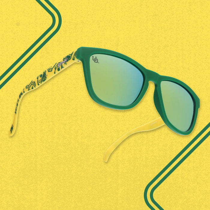 Three quarter angle of yellow-and-green shades featuring the Oregon Ducks duck mascot against a yellow background.