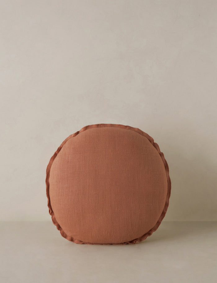 #color::rust | Arlo linen flange trim round pillow.
