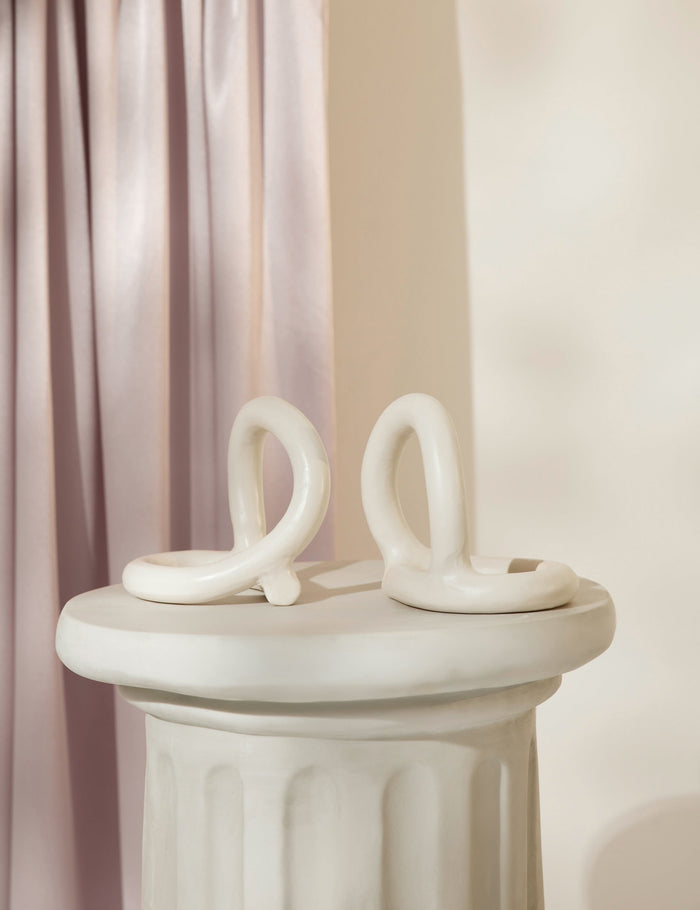 #color::cream | Bacchus white ceramic bookends by sin