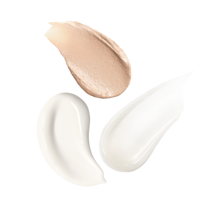 Texture swatches of the Skinfix Balancing Soft-Foam Clay Cleanser (a smooth, beige clay), Brighten + Firm 15% Vitamin C Serum (a thick, white cream), and Barrier Balancing Water Cream (a lightweight, white cream), on a transparent background.