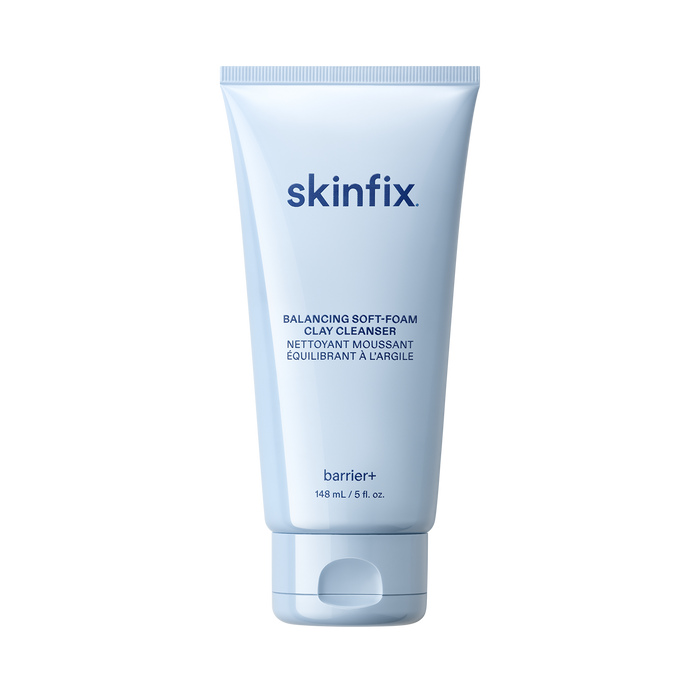 Skinfix Balancing Soft-Foam Clay Cleanser tube, 148 mL, in light blue packaging with navy text, on a transparent background.