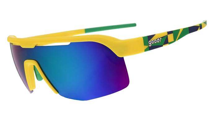 Side view of yellow shield sunglasses with light green mirrored lenses and patterned temple arms.