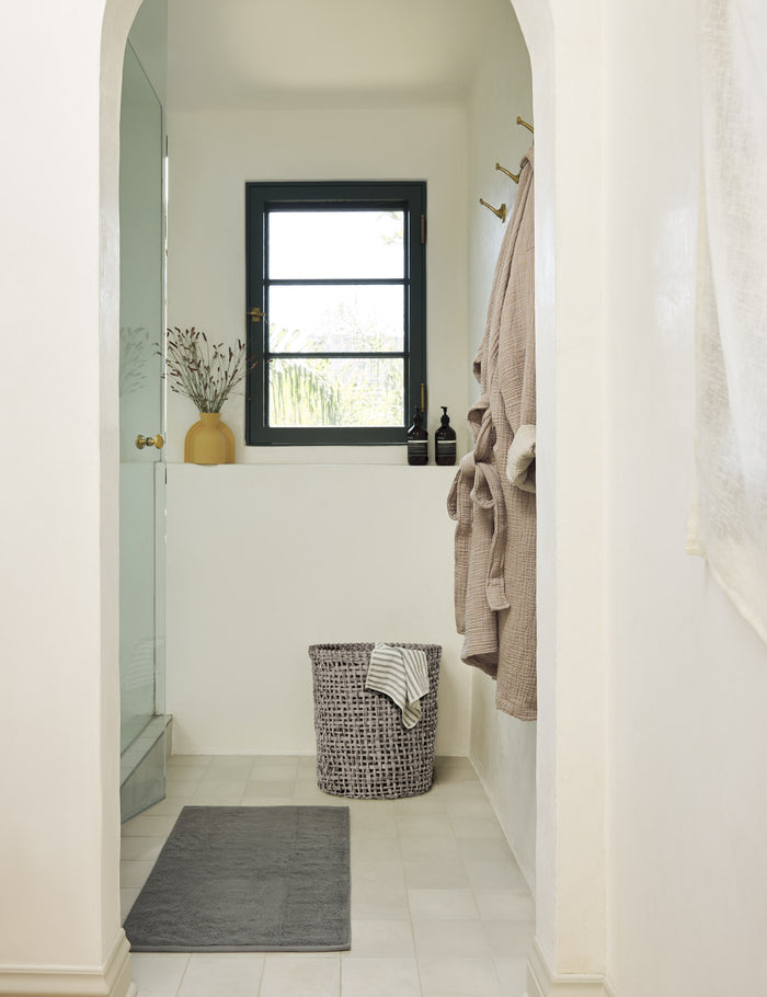 #color::slate | Detailed shot of the Cloud loom sustainable slate gray bath mat by coyuchi