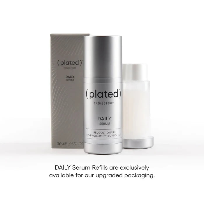 ( plated ) Skin Science 30 mL DAILY Refill Serum bottle, refill cartridge, and packaging with text that states 'DAILY Serum Refills are exclusively available for our upgraded packaging.