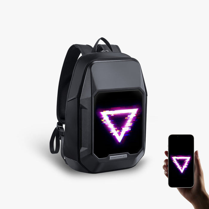 Divoom Cyberbag Pixel Art LED Backpack, black hard-shell backpack with a glowing pink and white neon triangle pixel display beside a matching phone screen, smartphone app controlled, techwear decor