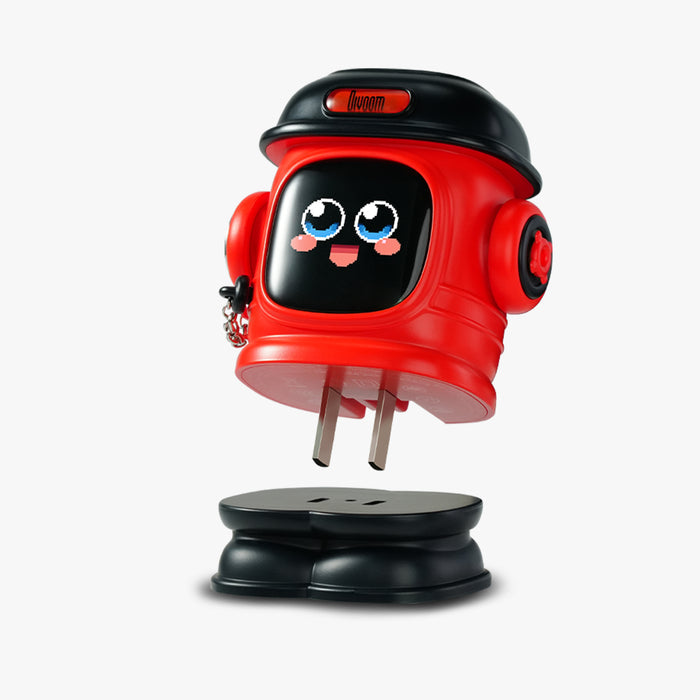 Divoom Dipow-65W Multi-socket Fast Charger, red astronaut-shaped charger with a black cap, cute pixel face screen and fold-out prongs on a plain background, smartphone app controlled, desk decor