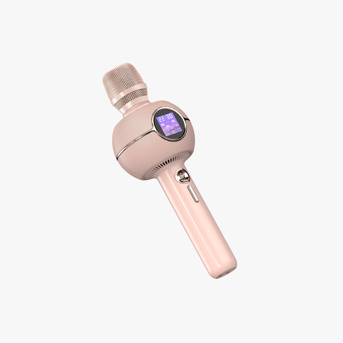 K-StarSpark, rose gold karaoke microphone with a rounded speaker head and small built-in display on a plain background, wireless audio fun for home party decor