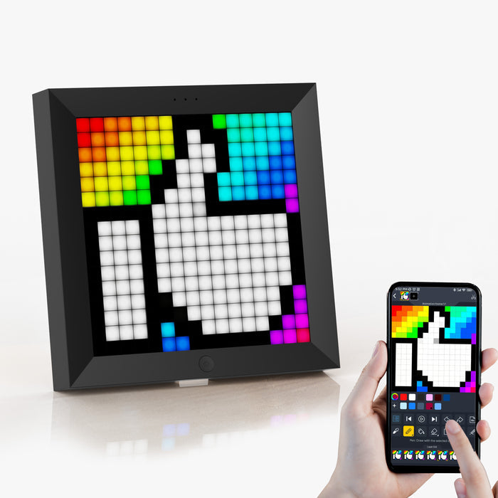 Divoom Pixoo 16x16 pixel art LED display, a white thumbs-up cursor with rainbow corners, smartphone app controlled, gaming desk decor