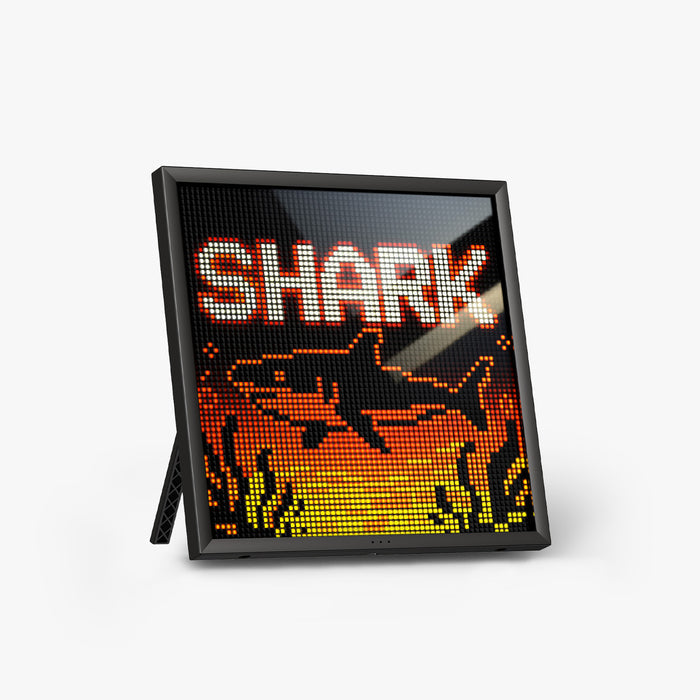 Divoom Pixoo64Ⅱ 64x64 Pixel Art LED Display Social Media Counter, a bold shark pixel graphic on a black screen, smartphone app controlled, gaming room decor