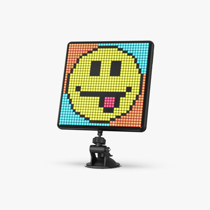 Divoom Pixoo-Max 32 X 32 Pixel Art LED Display, a yellow tongue-out smiley pixel face on an orange and blue background, smartphone app controlled, desk decor