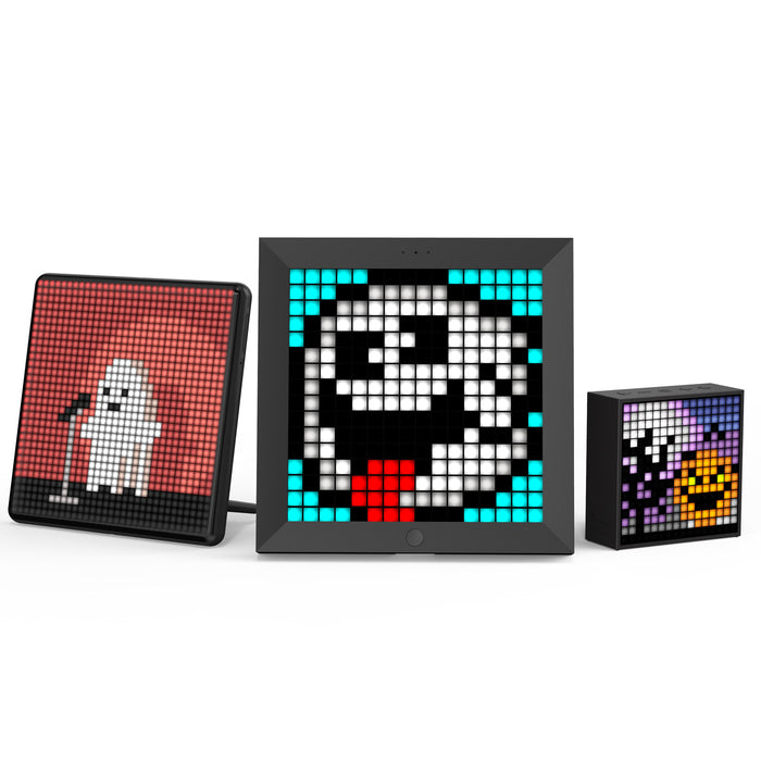 Divoom Pixoo & Pixoo-Max & Timebox-Evo, three black pixel art displays with ghost, panda, and jack-o-lantern animations on a plain white background, smartphone app controlled, desk decor