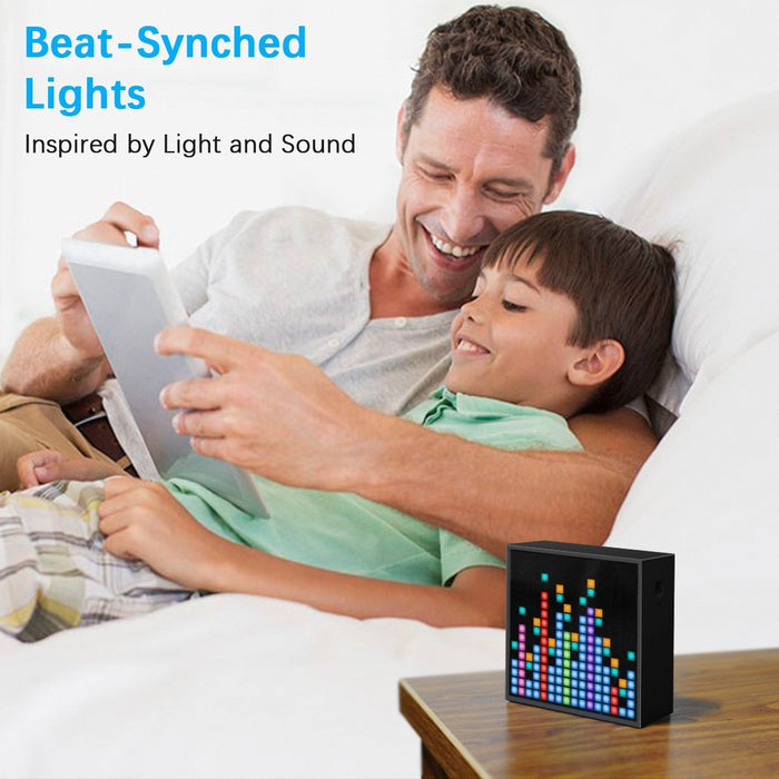 Divoom Timebox-Evo Pixel Art Speaker 16x16 DIY LED Display Alarm Clock Box, a colorful beat-synced equalizer display on a bedside table, audio-reactive, bedroom decor