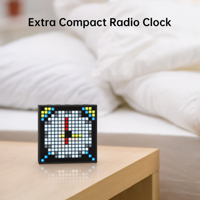 Divoom Timebox-Evo Pixel Art Speaker 16x16 DIY LED Display Alarm Clock Box, a white pixel clock face on a bedside table, speaker for radio and audio playback, bedroom nightstand decor