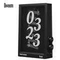 Times Frame Pure, black vertical digital display with oversized white clock numbers, weather and date icons, smartphone app controlled, modern desk or bedside decor