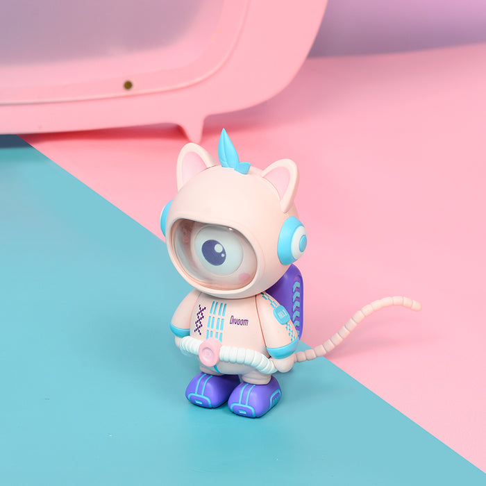Divooo-The Divoom Mascot, a pastel pink cat astronaut figure with one large eye, blue accents and a striped tail, smartphone app controlled, playful desk decor