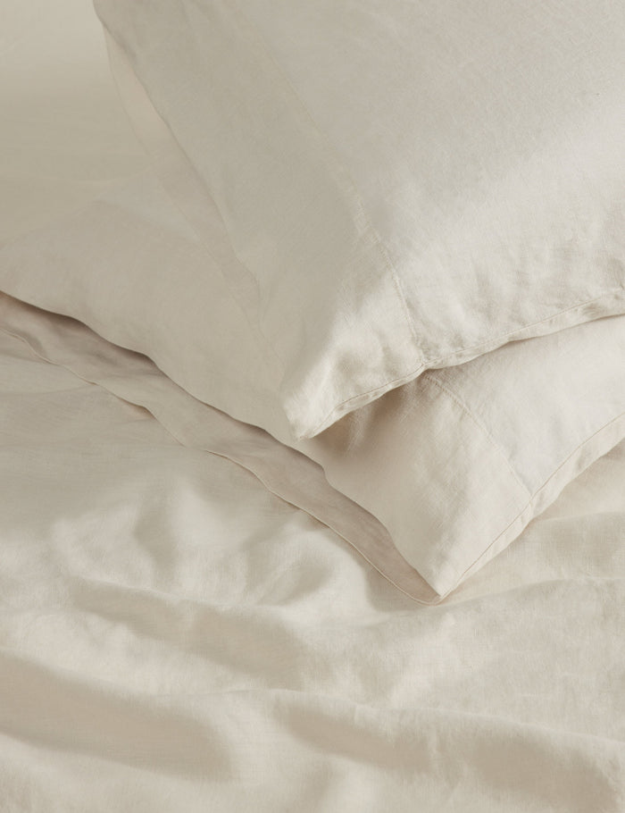 #color::cream #size::standard #size::king | Close up view of the Essie soft, breathable hemp pillowcase