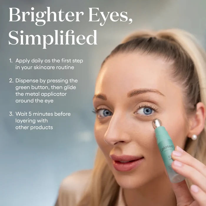 Woman applying ( plated ) EYE Serum with the metal applicator. Apply daily as the first skincare step, press the green button, and glide around the eye, then wait 5 minutes before layering other products.