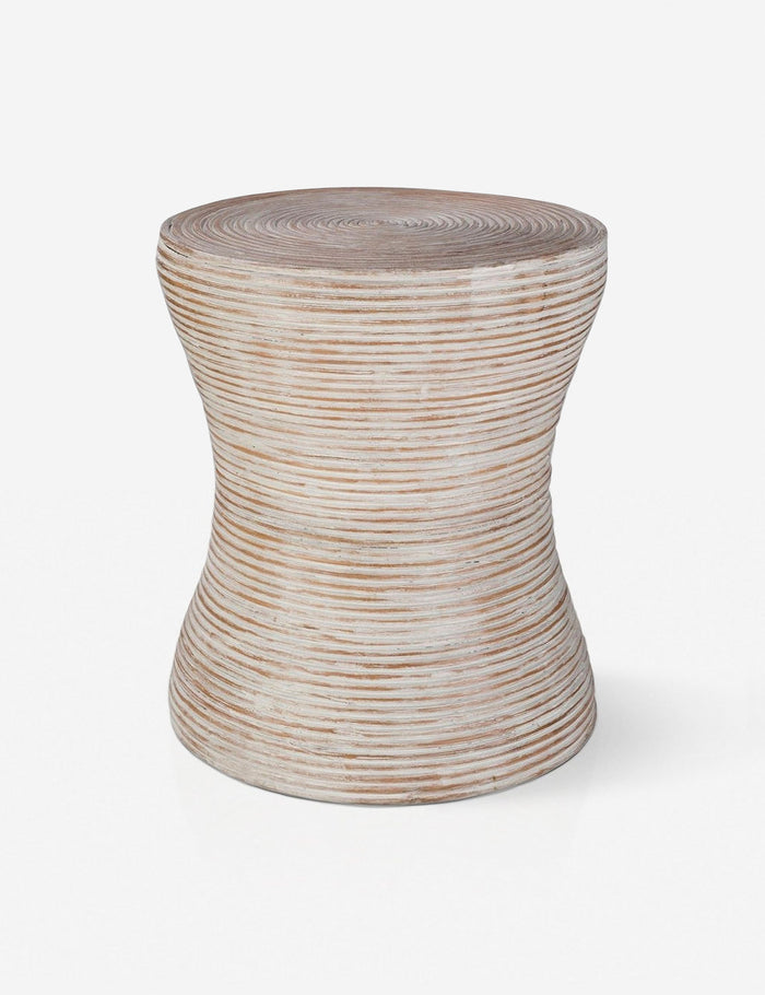 | Fenne round ribbed stone side table.