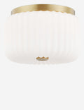 | Harissa white ribbed flush mount light with brass detail