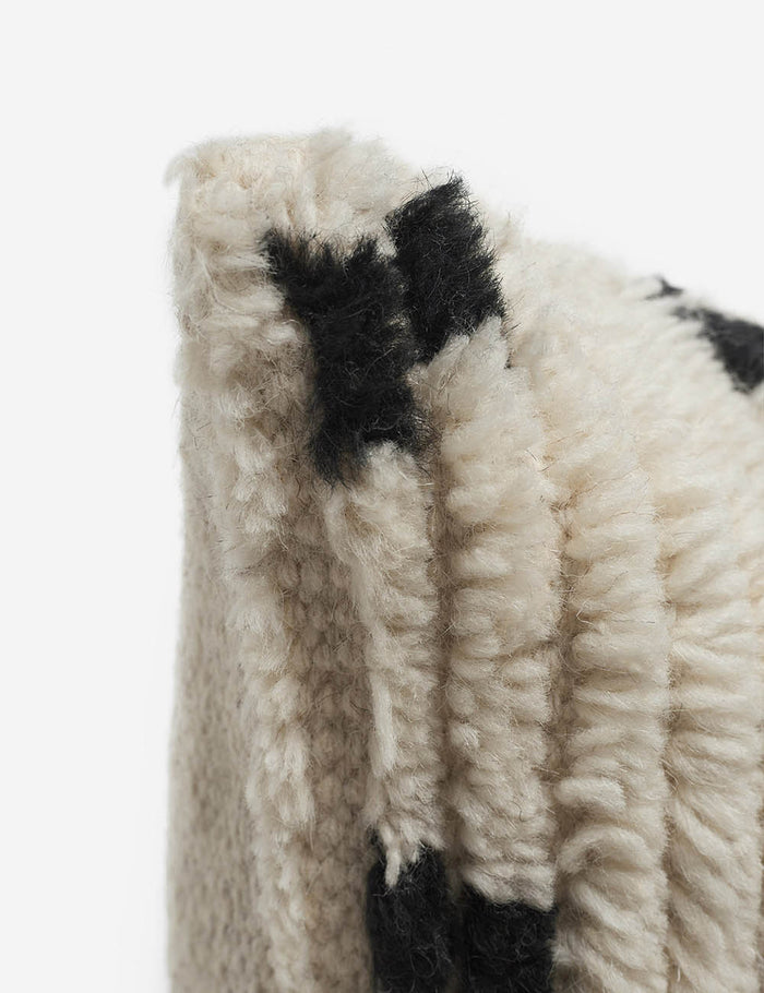 #style::square | Corner shot of the Irregular Dots Ivory Square Pillow by Sarah Sherman Samuel