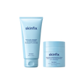 Skinfix Ceramide + Ectoin Gentle Gel Cleanser (150 mL) and Ceramide Prime Whipped Cream (50 mL), both in light blue packaging with navy text, on a transparent background.