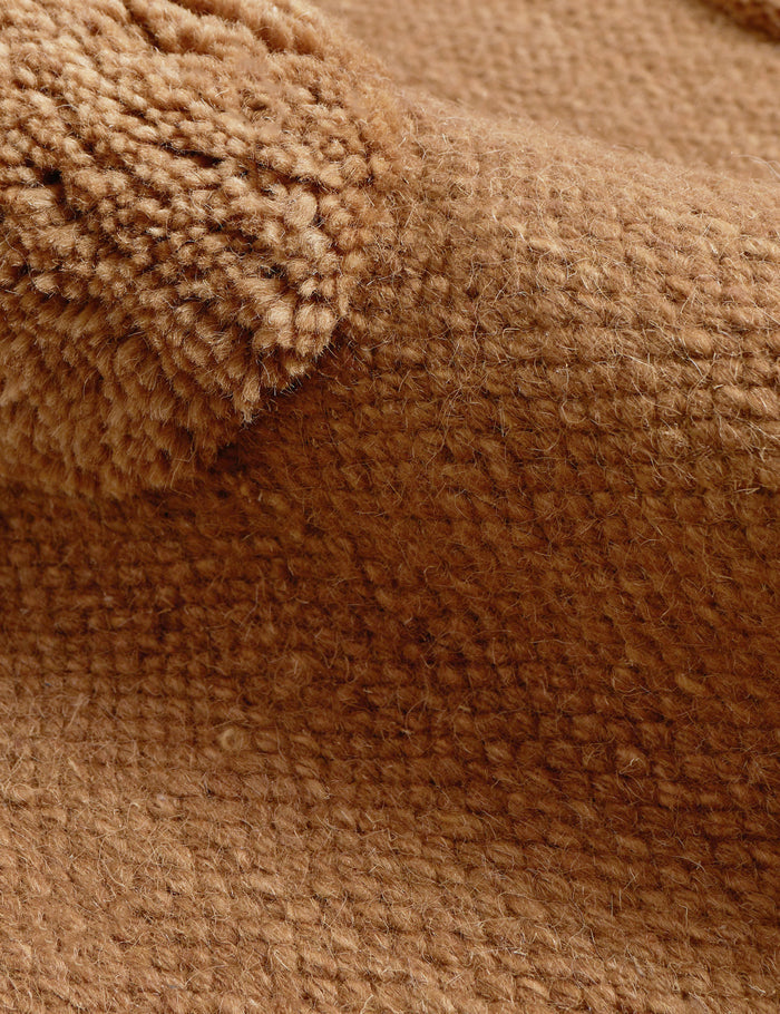 #color::camel #size::2--x-3- #size::2-6--x-8- #size::3--x-5- #size::6--x-9- #size::8--x-10- #size::9--x-12- #size::10--x-14- #size::12--x-15- | Close up of the Kohta high-low pile dot design wool area rug in camel