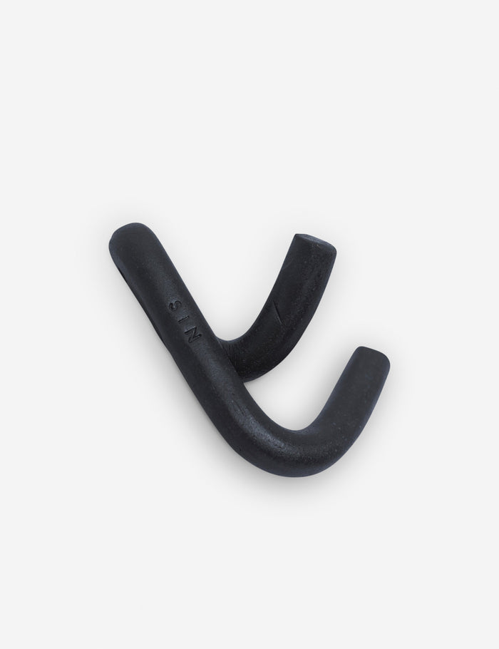 #color::black | Angled view of the Black Leggy Crossed Wall Hook by SIN Ceramics