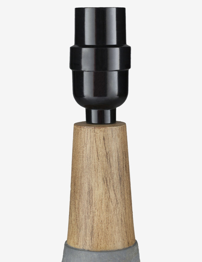 #color::stone | Close-up of the light fixture on the Marcella gray vase-shaped Mini Table Lamp with ceramic base