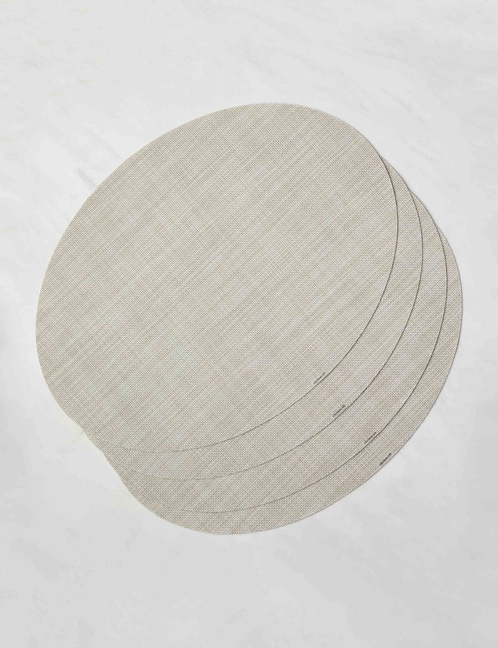 #color::parchment | Set of four parchment-toned Mini Basketweave Oval Placemat by Chilewich
