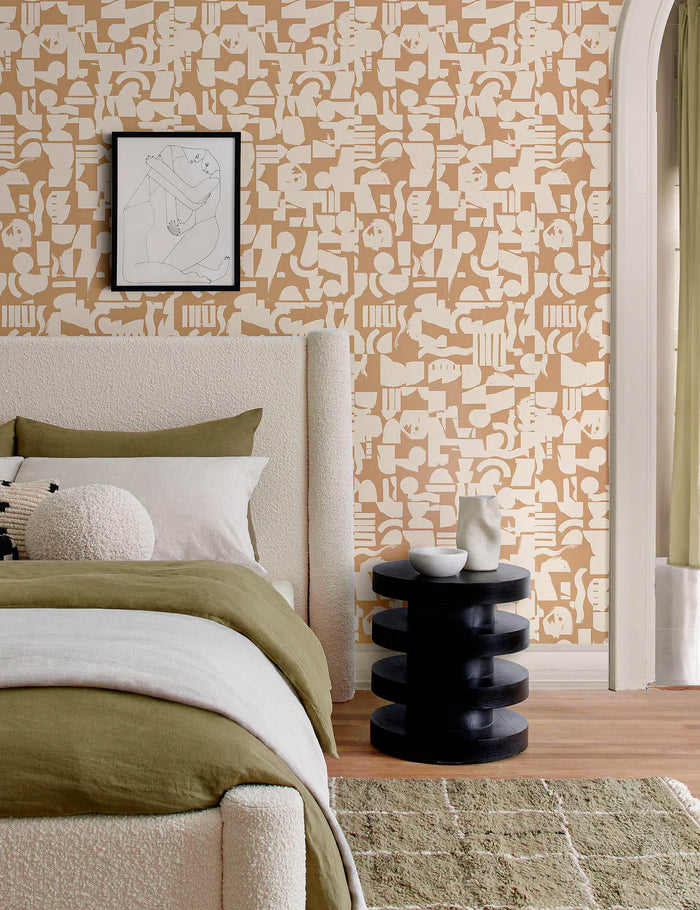 #color::tan-+-ivory | Ivory and taupe Organic Shapes Wallpaper by Sarah Sherman Samuel is in a bedroom with a boucle framed bed, a khaki green area rug, and a black nightstand