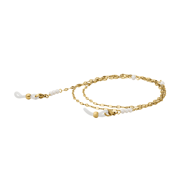 A coiled gold glasses chain with freshwater pearl beads and silicone loops on the end on a white background.