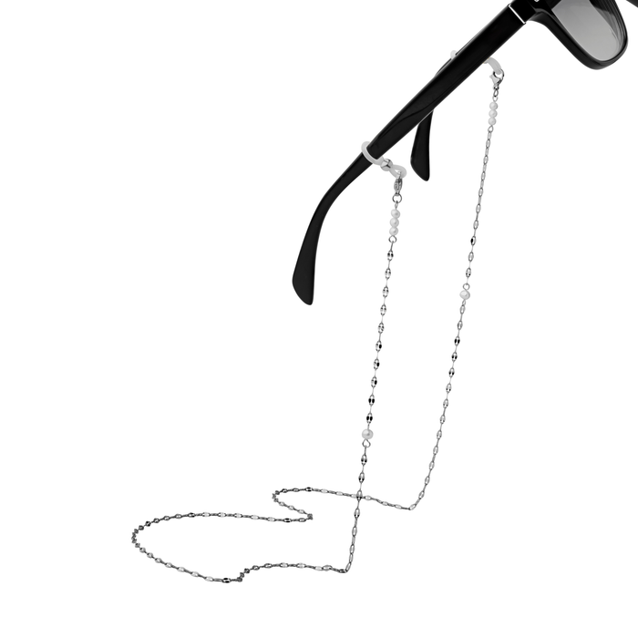 Silver eyeglass chain attached to black sunglasses on a white background