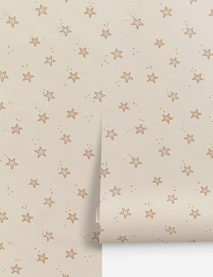 | Starfish cream and orange wallpaper by Rylee + Cru